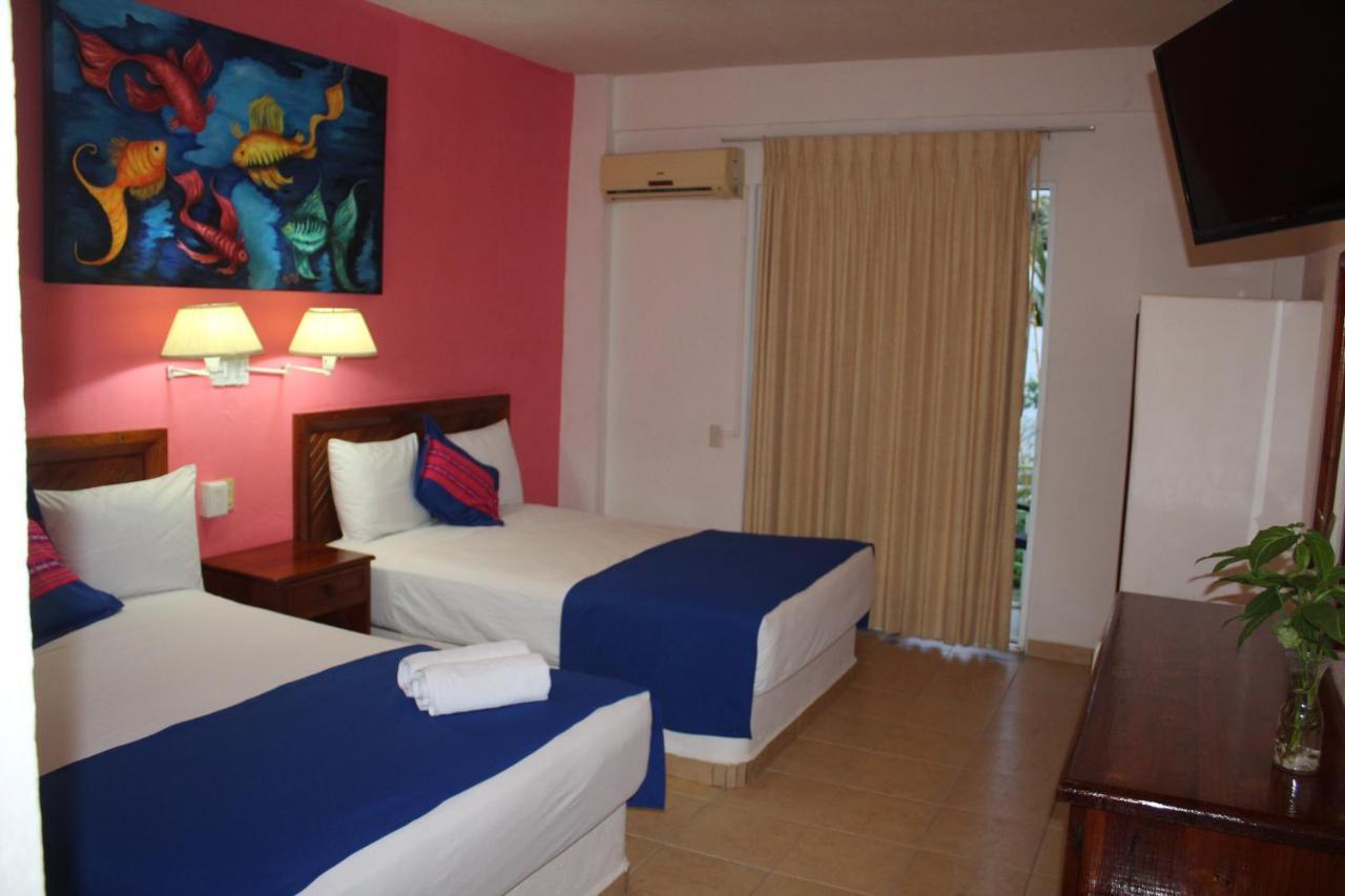 Hotel Arenas Del Pacifico Santa Cruz Huatulco Bagian luar foto