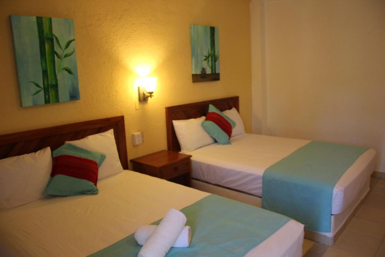 Hotel Arenas Del Pacifico Santa Cruz Huatulco Bagian luar foto