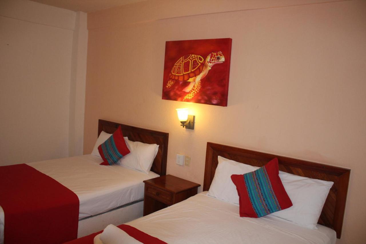 Hotel Arenas Del Pacifico Santa Cruz Huatulco Bagian luar foto
