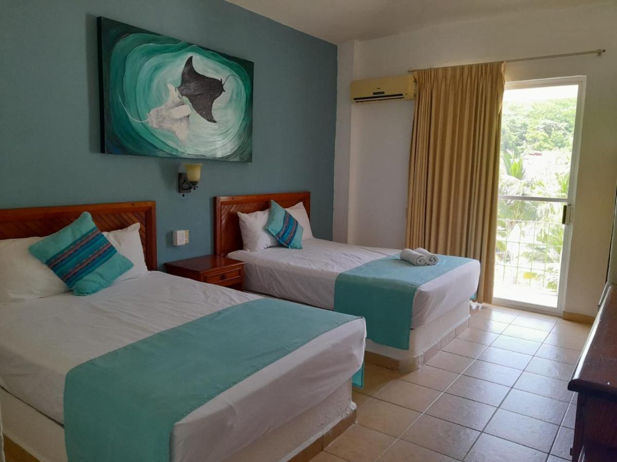 Hotel Arenas Del Pacifico Santa Cruz Huatulco Bagian luar foto